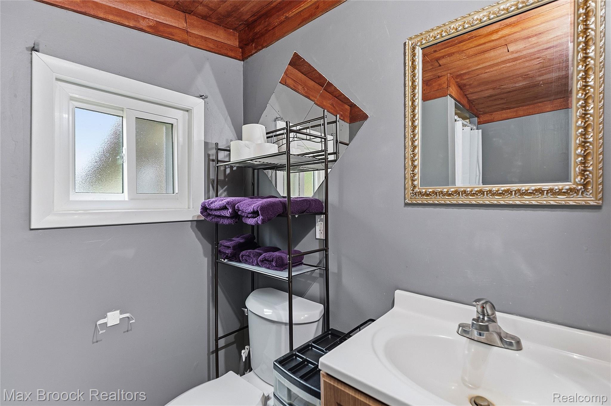 1392 Maple Grove Road Lapeer, MI 48446 - Photo 37 of 70 Bathroom featuring wood ceiling, vanity, and a shower with shower curtain