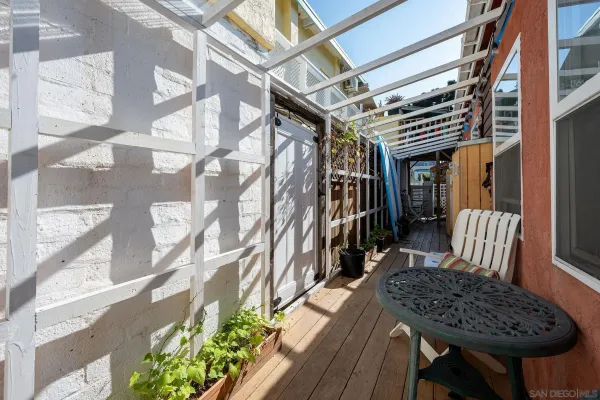 a view of balcony and wooden floor