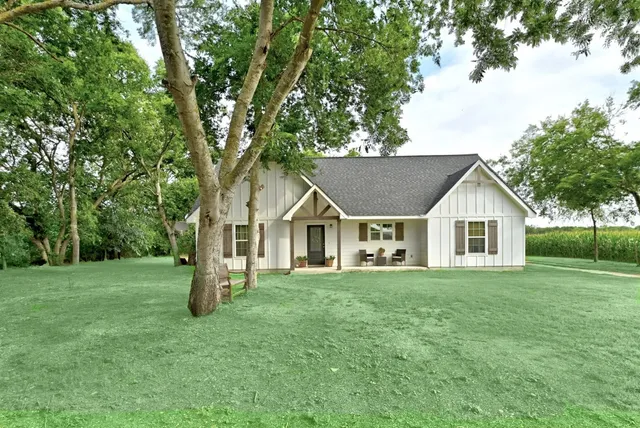 front view of a house with a yard