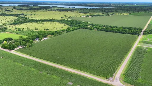 a view of a lake with a big yard