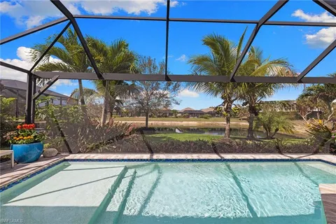 a view of a backyard with sitting area