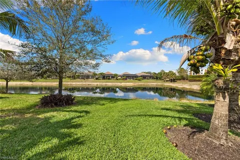 a view of a lake with a big yard