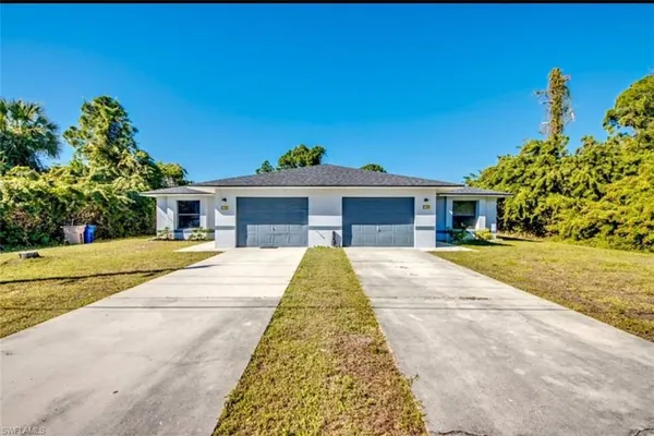 $410,000 | 110 Gretchen Avenue South, Lehigh Acres, FL 33973