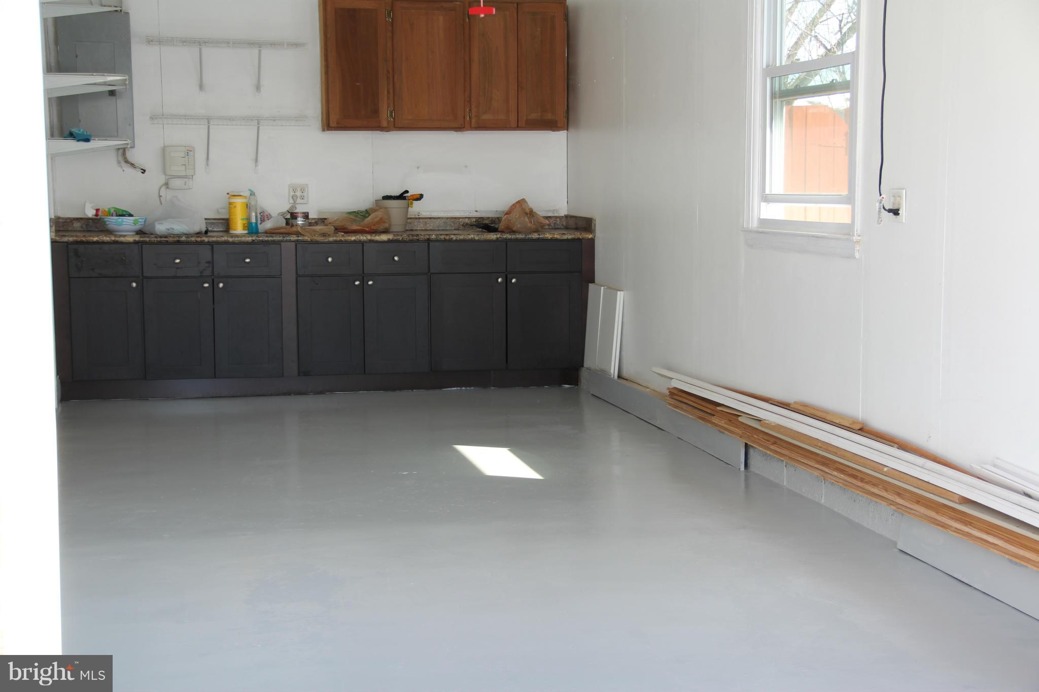 204 West Ash Road Sterling, VA 20164 - Photo 14 of 14 a kitchen with a sink and cabinets