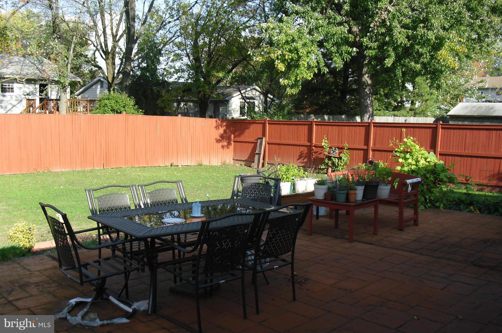 204 West Ash Road Sterling, VA 20164 - Photo 3 of 14 a view of a chairs and table in patio