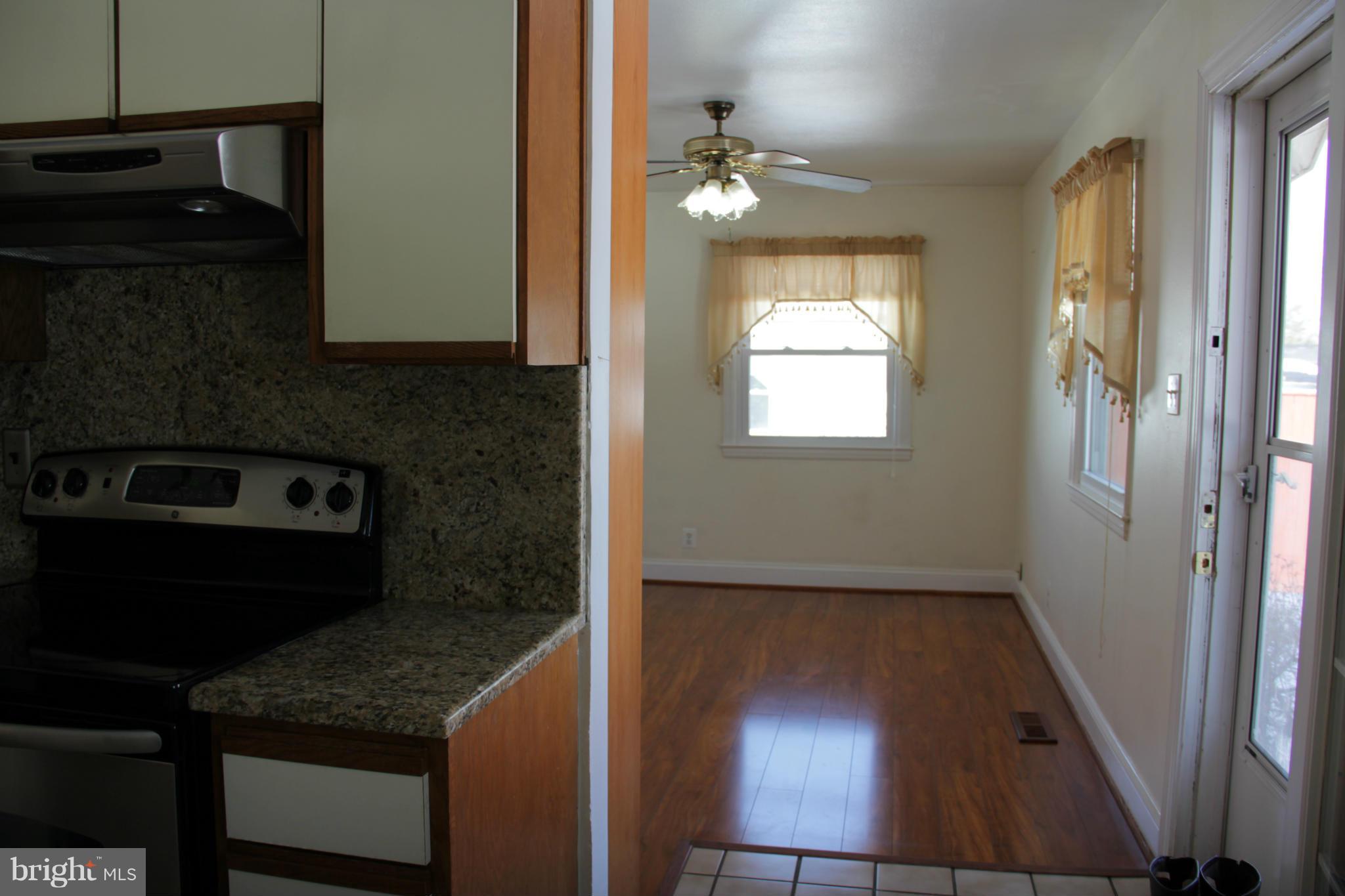 204 West Ash Road Sterling, VA 20164 - Photo 5 of 14 a kitchen with a sink and cabinets