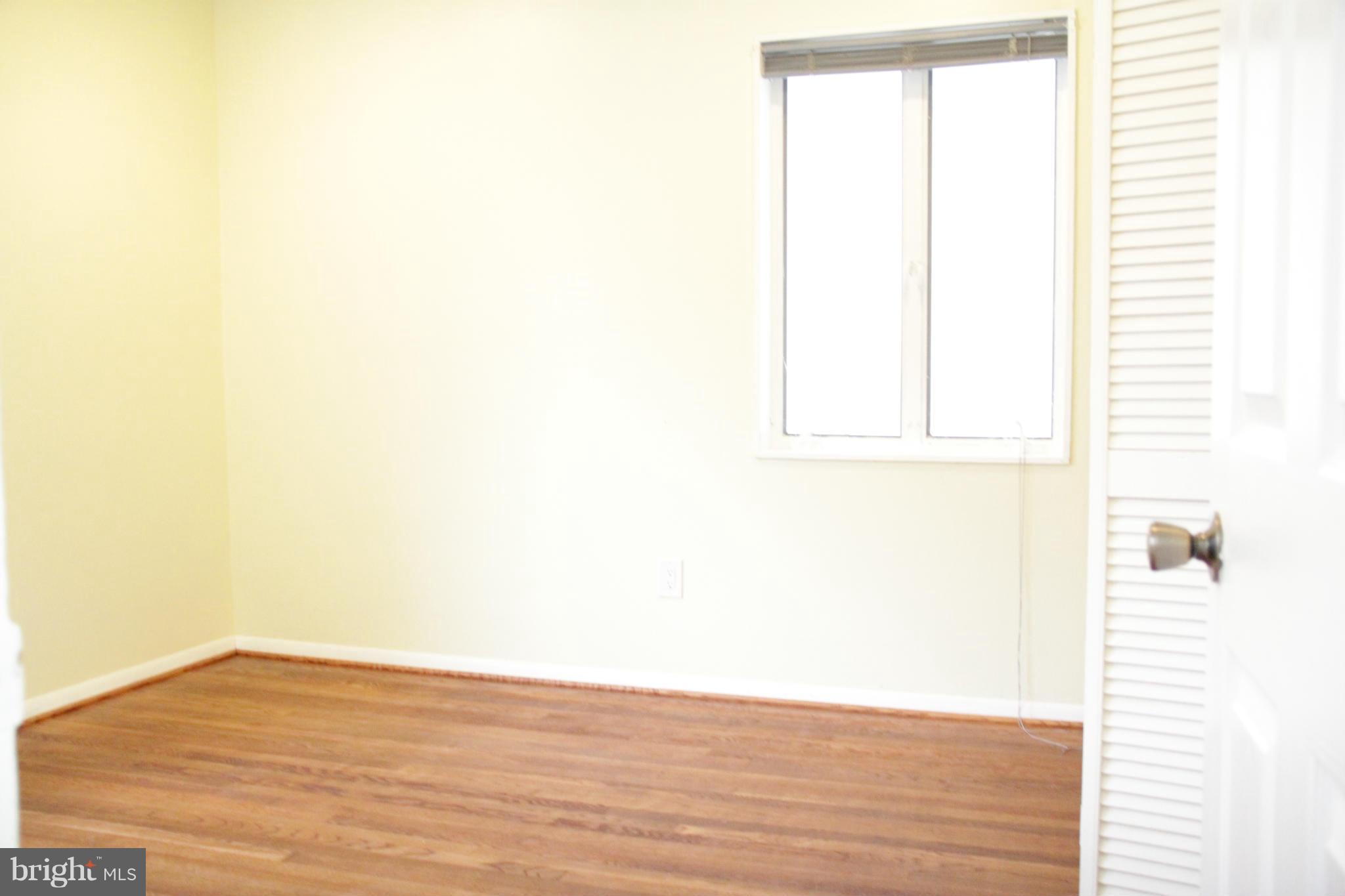 204 West Ash Road Sterling, VA 20164 - Photo 8 of 14 a view of a small space with wooden floor