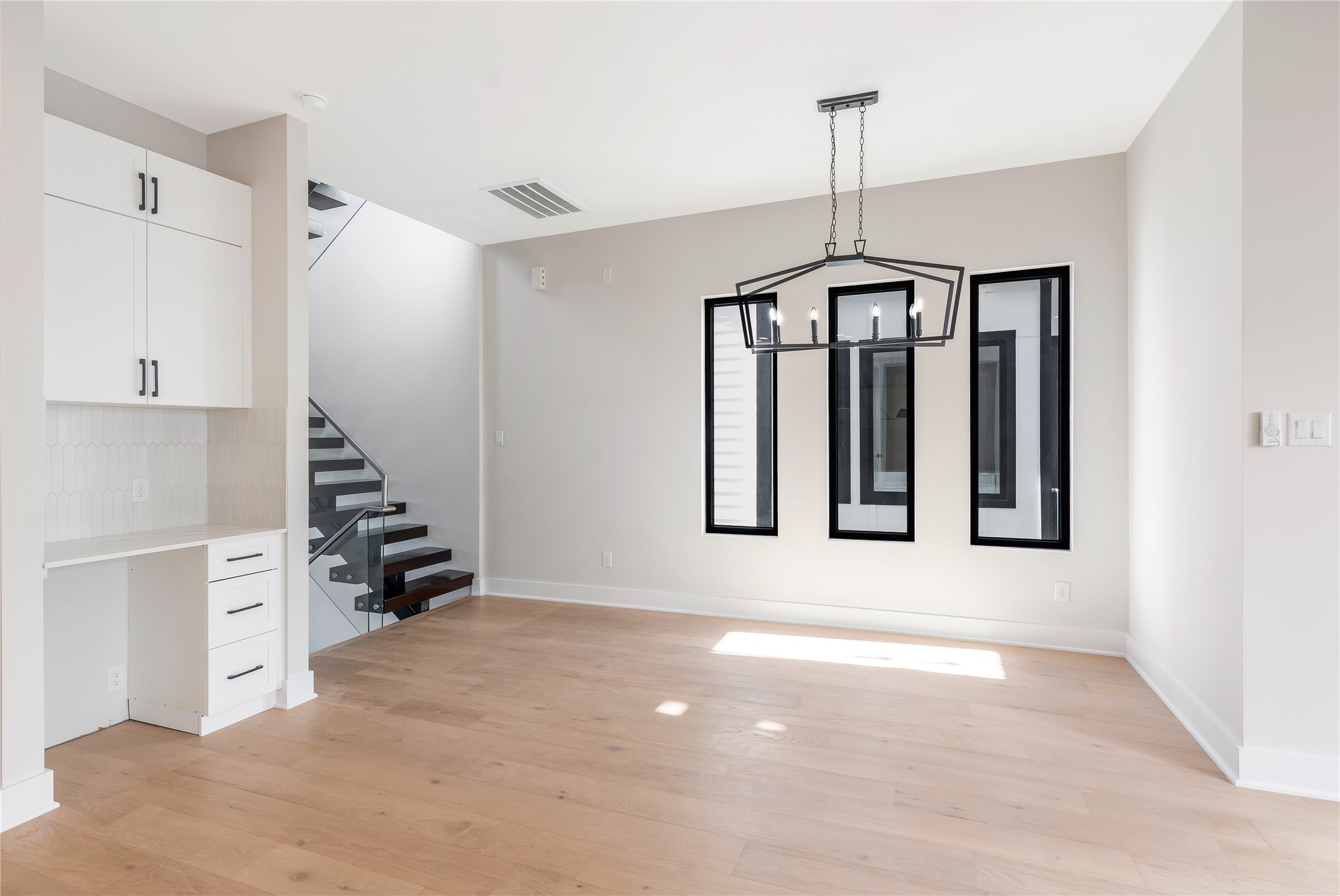 2235 Blalock Road Houston, TX 77080 - Photo 14 of 33 a view of an entryway with wooden floor