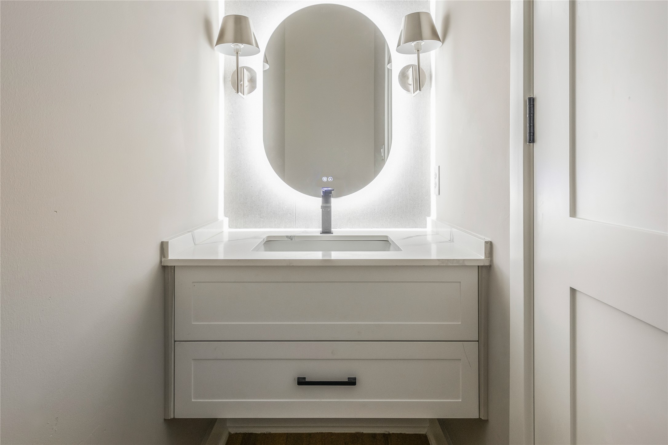 2235 Blalock Road Houston, TX 77080 - Photo 16 of 33 a bathroom with a sink and a mirror