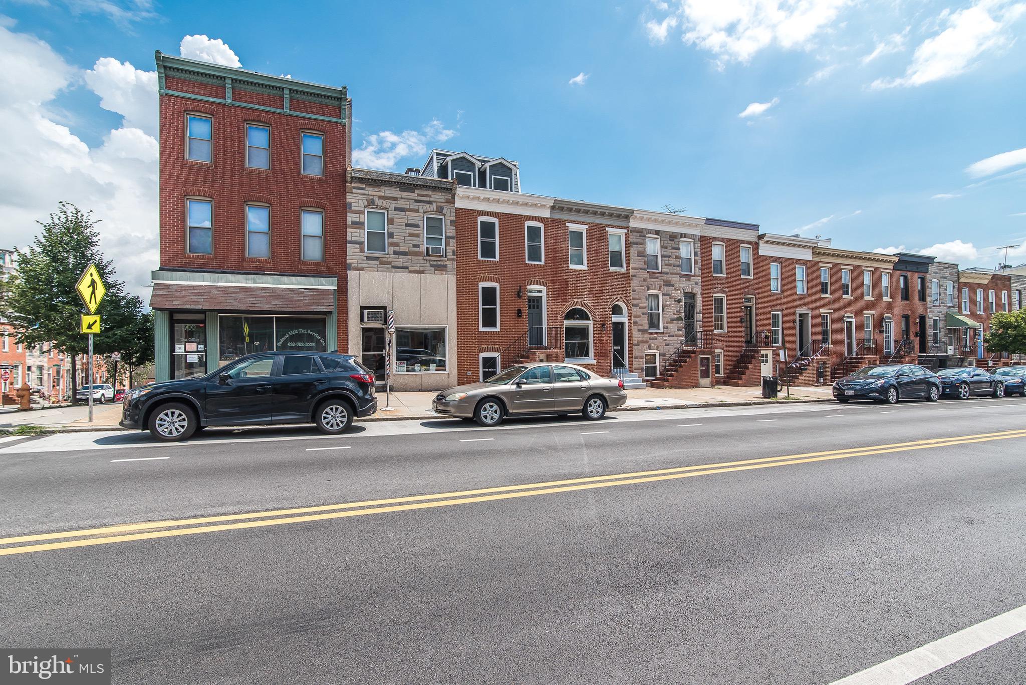 704 East Fort Avenue Baltimore, MD 21230 - Photo 20 of 58 a view of a street that has couple of cars parked on the road
