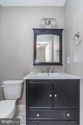 a kitchen with stainless steel appliances a refrigerator stove and microwave