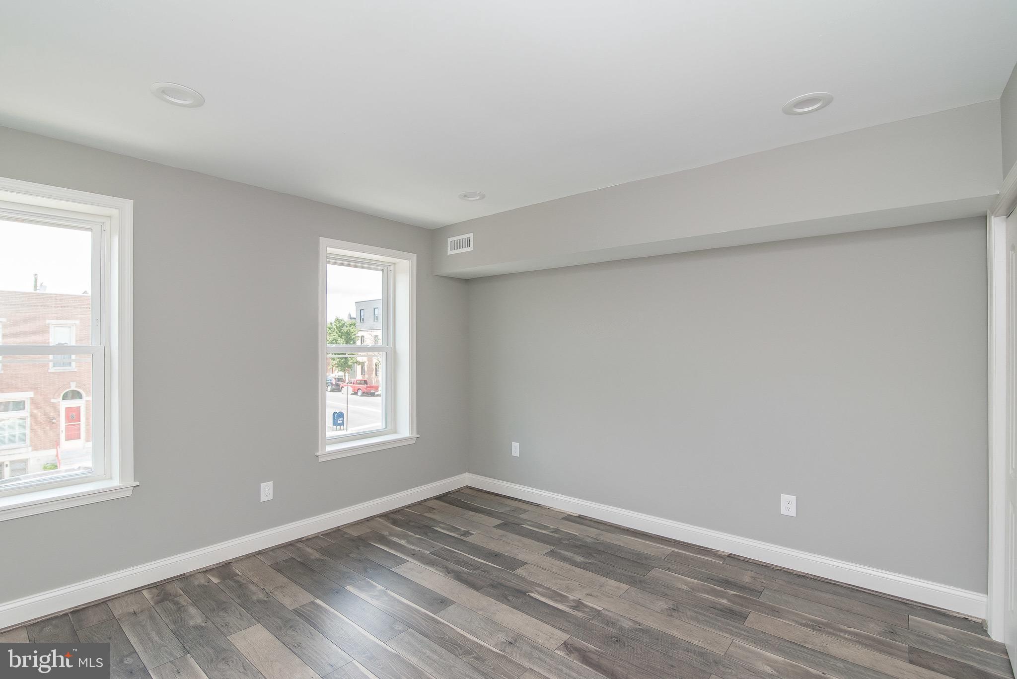 704 East Fort Avenue Baltimore, MD 21230 - Photo 42 of 58 an empty room with windows