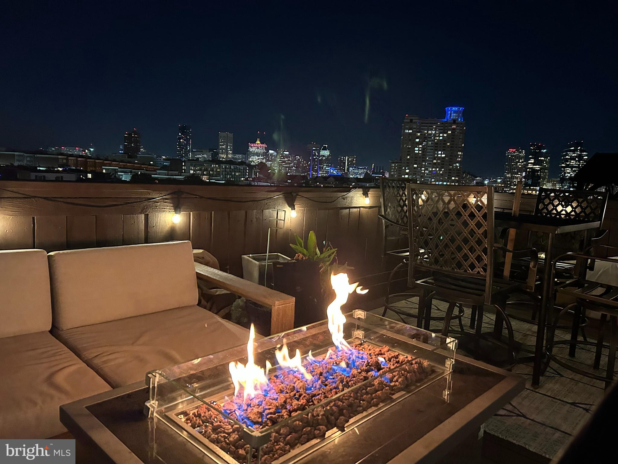 704 East Fort Avenue Baltimore, MD 21230 - Photo 55 of 58 a outdoor dining space with furniture and city view