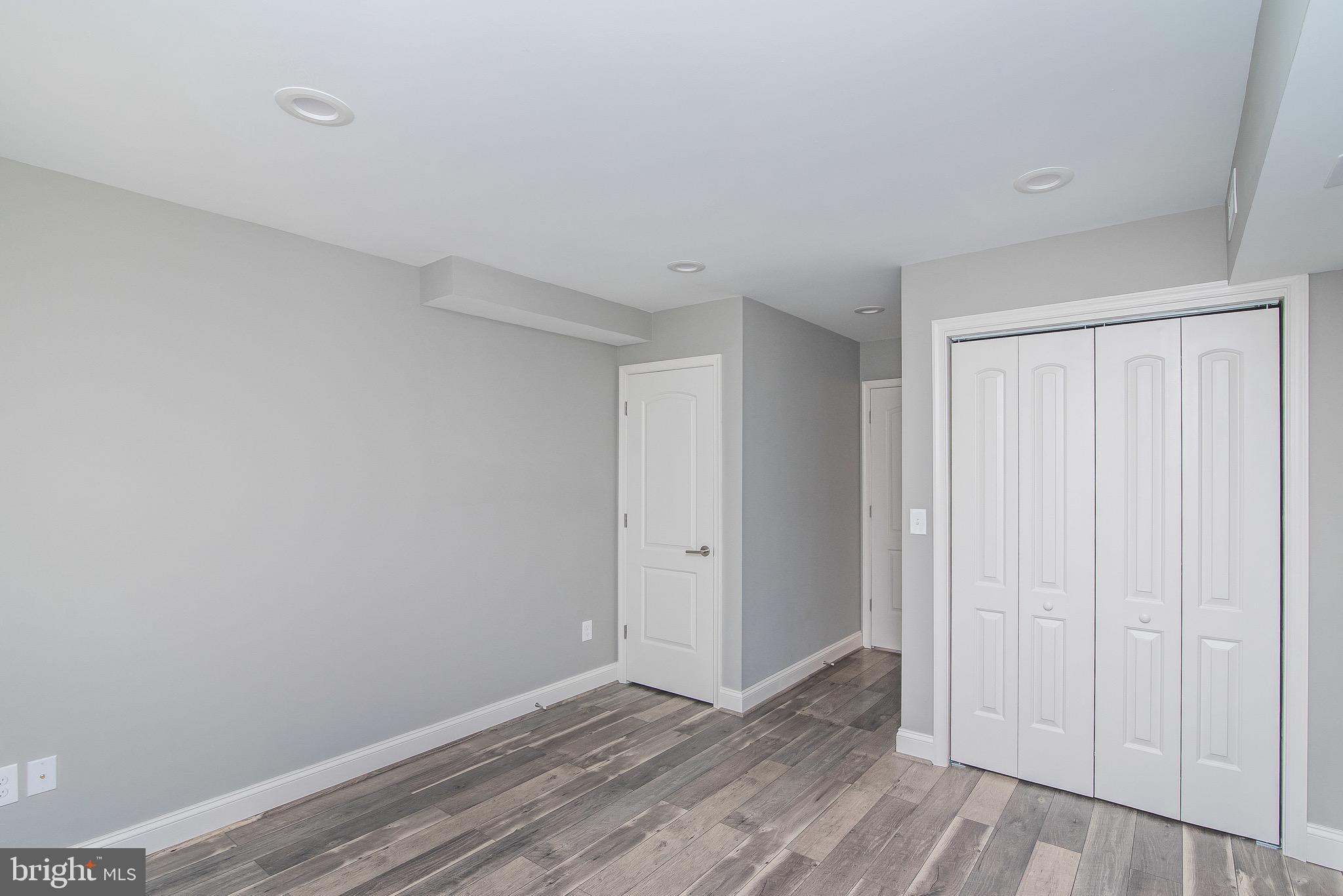 704 East Fort Avenue Baltimore, MD 21230 - Photo 10 of 58 a view of an empty room and wooden floor