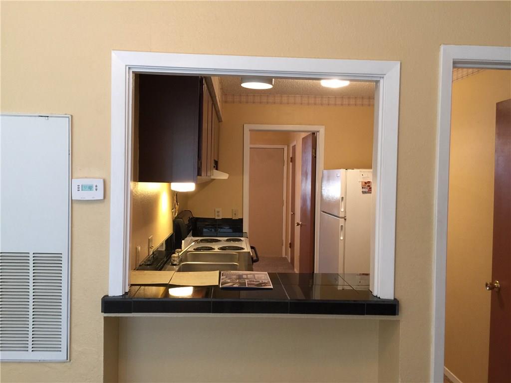3000 Guadalupe Street, Unit 307 Austin, TX 78705 - Photo 11 of 21 a bathroom with a mirror