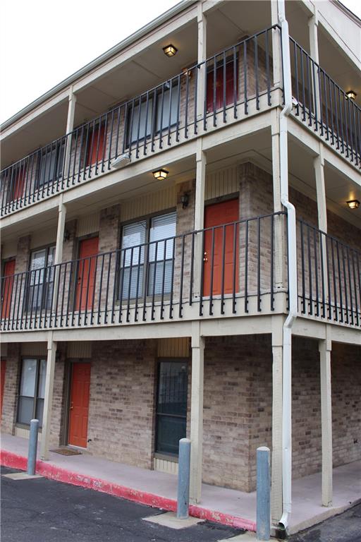 3000 Guadalupe Street, Unit 307 Austin, TX 78705 - Photo 2 of 21 a building with granite countertop lots of windows