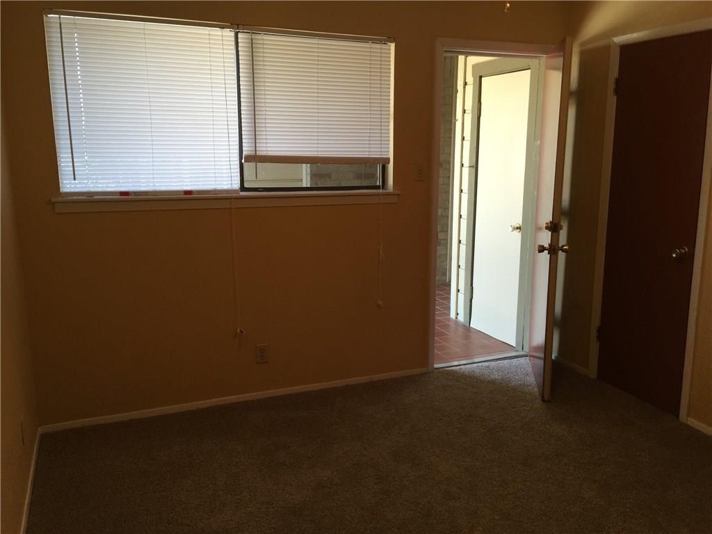 3000 Guadalupe Street, Unit 307 Austin, TX 78705 - Photo 3 of 21 an empty room with windows