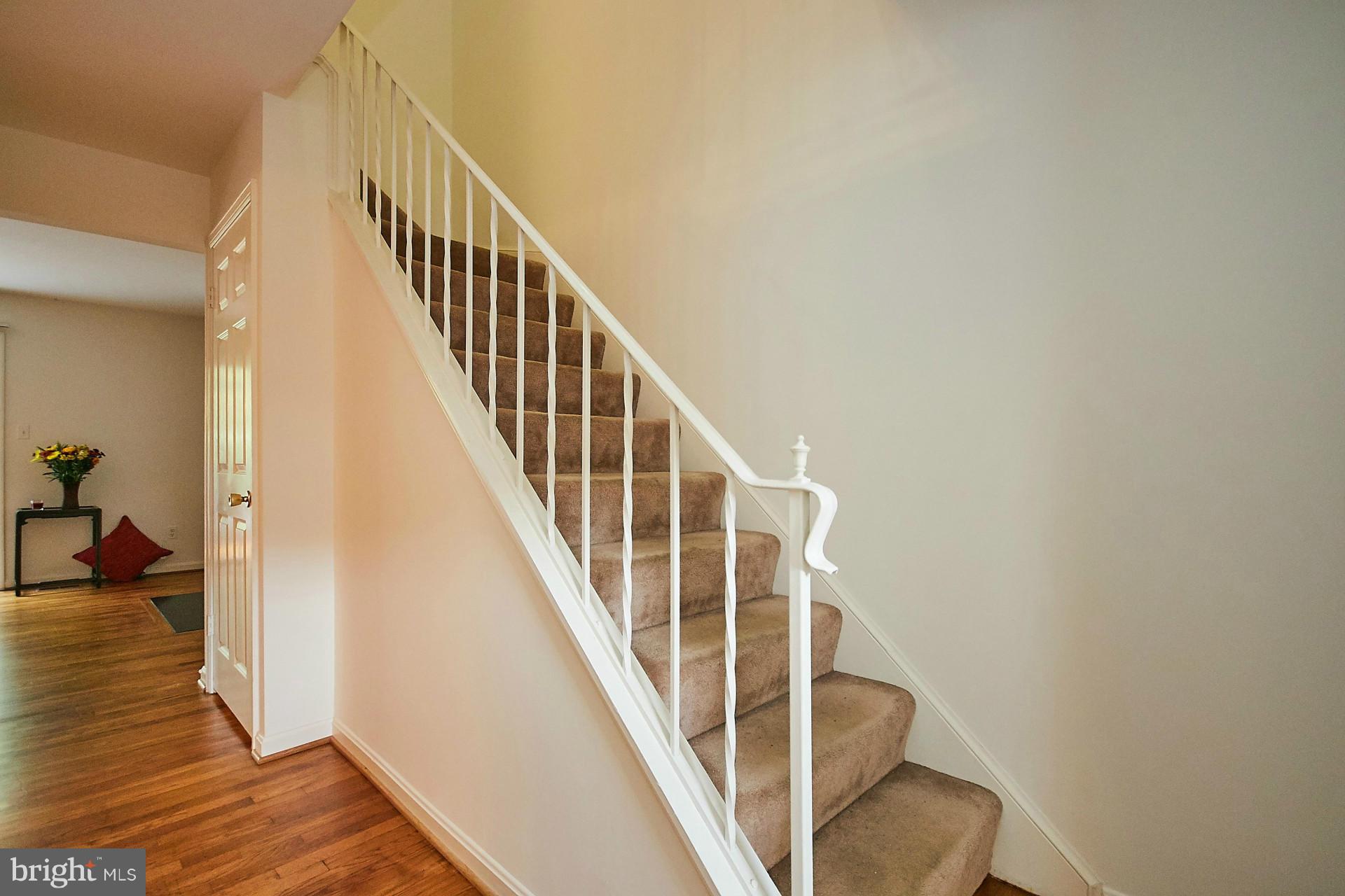 7052 Leestone Street Springfield, VA 22151 - Photo 12 of 30 Staircase to Upper Level
