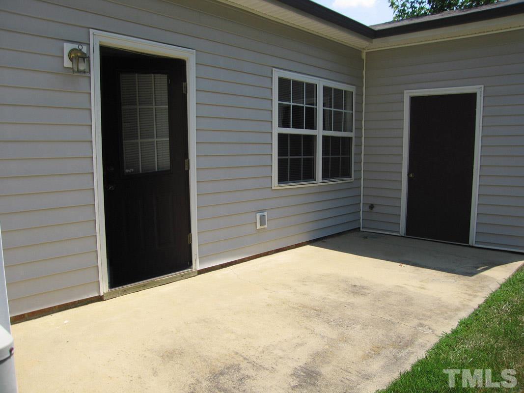 101 Rock Haven Road, Unit D402 Carrboro, NC 27510 - Photo 12 of 14 a backyard of a house