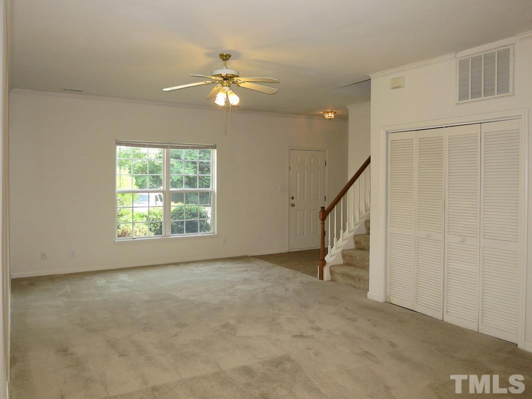 101 Rock Haven Road, Unit D402 Carrboro, NC 27510 - Photo 4 of 14 a view of an empty room with a window