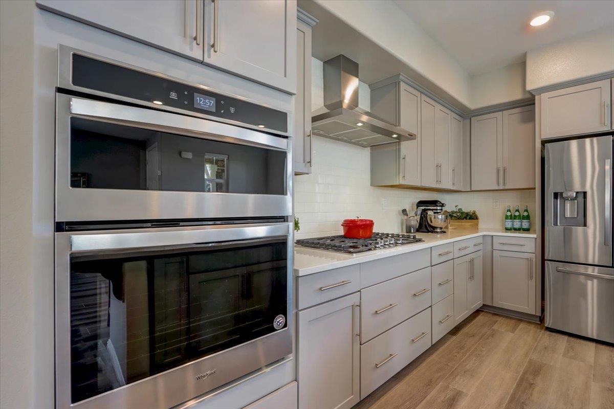 2652 Admiral Circle Hayward, CA 94545 - Photo 15 of 51 a kitchen with cabinets and stainless steel appliances