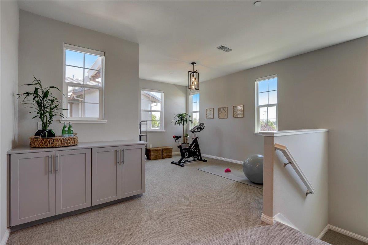 2652 Admiral Circle Hayward, CA 94545 - Photo 20 of 51 a room with furniture a chandelier and a window