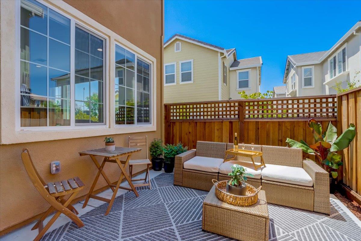 2652 Admiral Circle Hayward, CA 94545 - Photo 2 of 51 a balcony with furniture and a potted plant