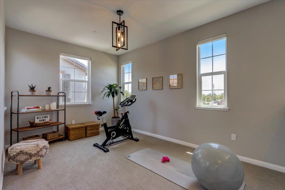 2652 Admiral Circle Hayward, CA 94545 - Photo 21 of 51 a view of a workspace with furniture and a window
