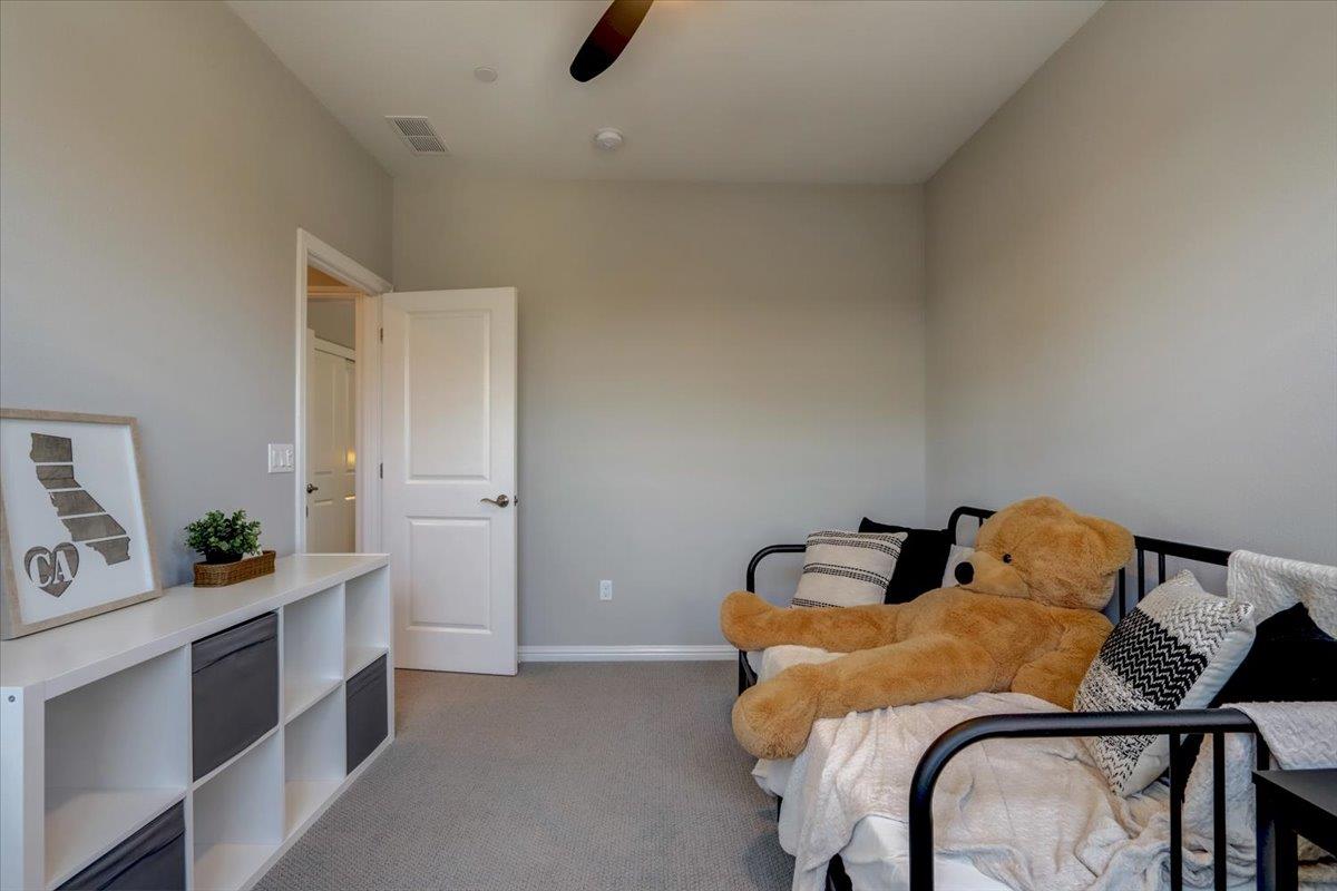 2652 Admiral Circle Hayward, CA 94545 - Photo 27 of 51 a bedroom with a bed and cabinets