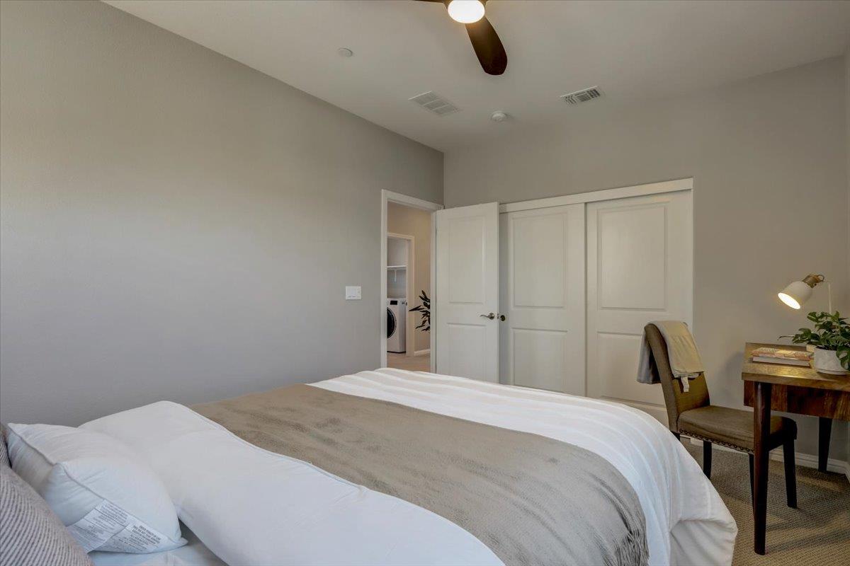 2652 Admiral Circle Hayward, CA 94545 - Photo 30 of 51 a bedroom with a bed and a chair