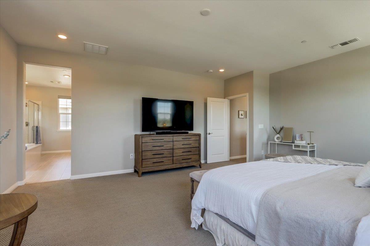 2652 Admiral Circle Hayward, CA 94545 - Photo 33 of 51 a bedroom with a bed and a flat screen tv