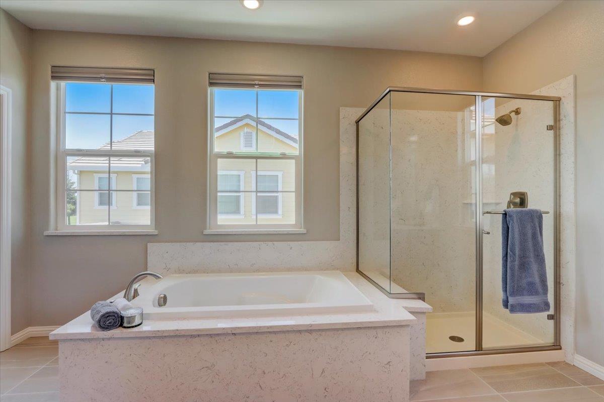 2652 Admiral Circle Hayward, CA 94545 - Photo 36 of 51 a bathroom with a tub a sink and a window