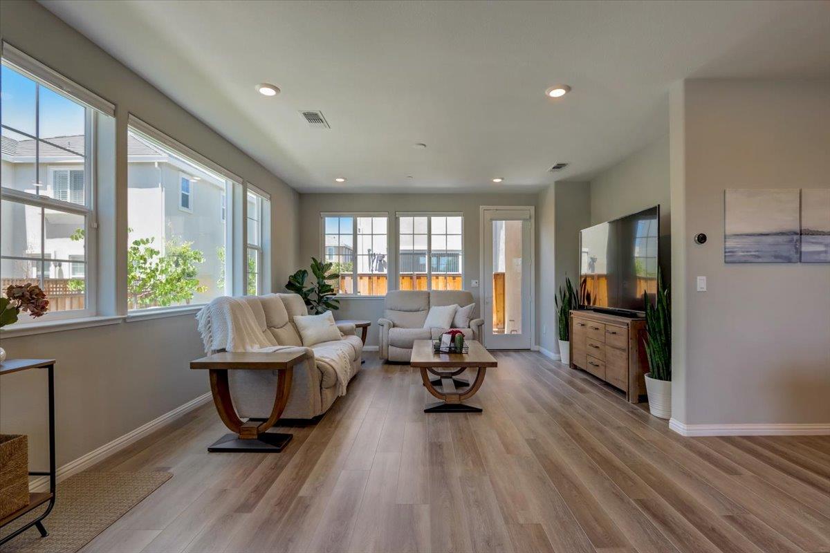 2652 Admiral Circle Hayward, CA 94545 - Photo 5 of 51 a living room with furniture a large window wooden floor and a rug
