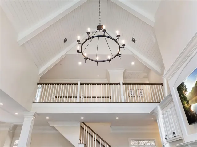 a close view of cabinet with a flat screen tv and a window