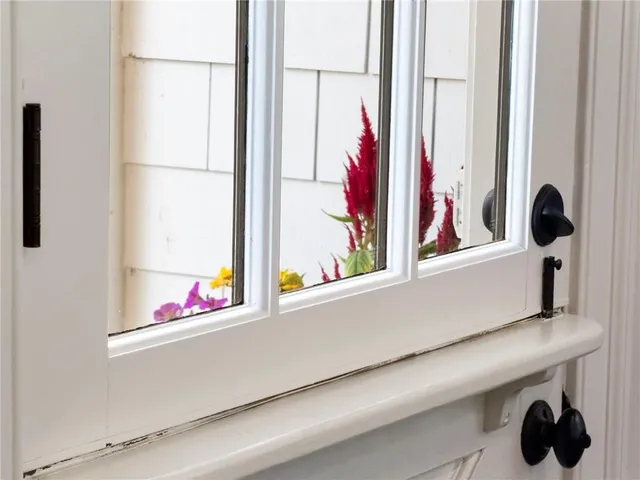 a bathroom with a granite countertop sink a mirror a vanity and