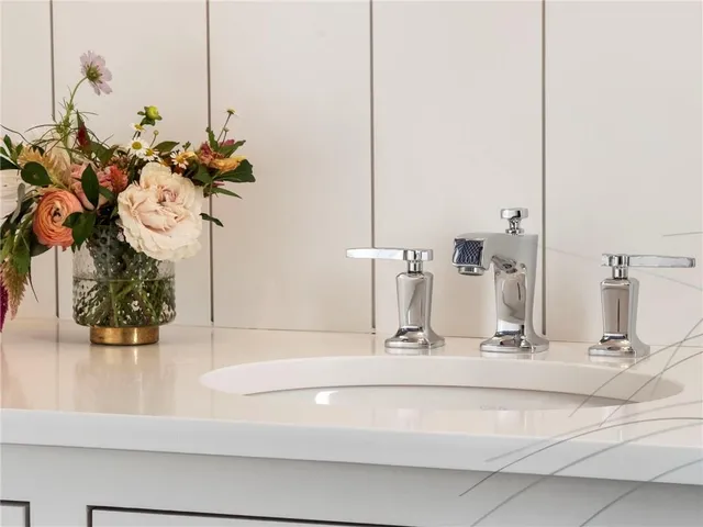 a view of a garden in front of a house