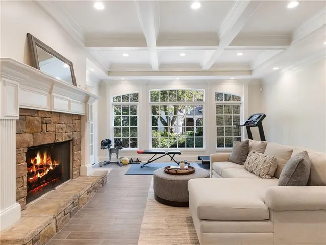an aerial view of residential house with outdoor space and swimming pool