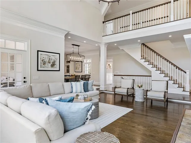 a kitchen with cabinets appliances a sink and a window