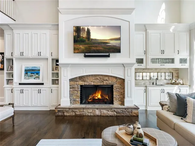 a kitchen with a sink stove and microwave