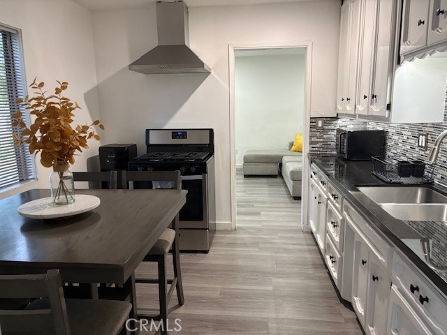 7249 Marcelle Street Paramount, CA 90723 - Photo 10 of 26 Front unit kitchen