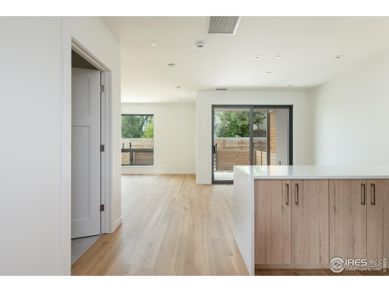 2130 Folsom Street Boulder, CO 80302 - Photo 13 of 40 a view interior of a house with wooden floor and windows