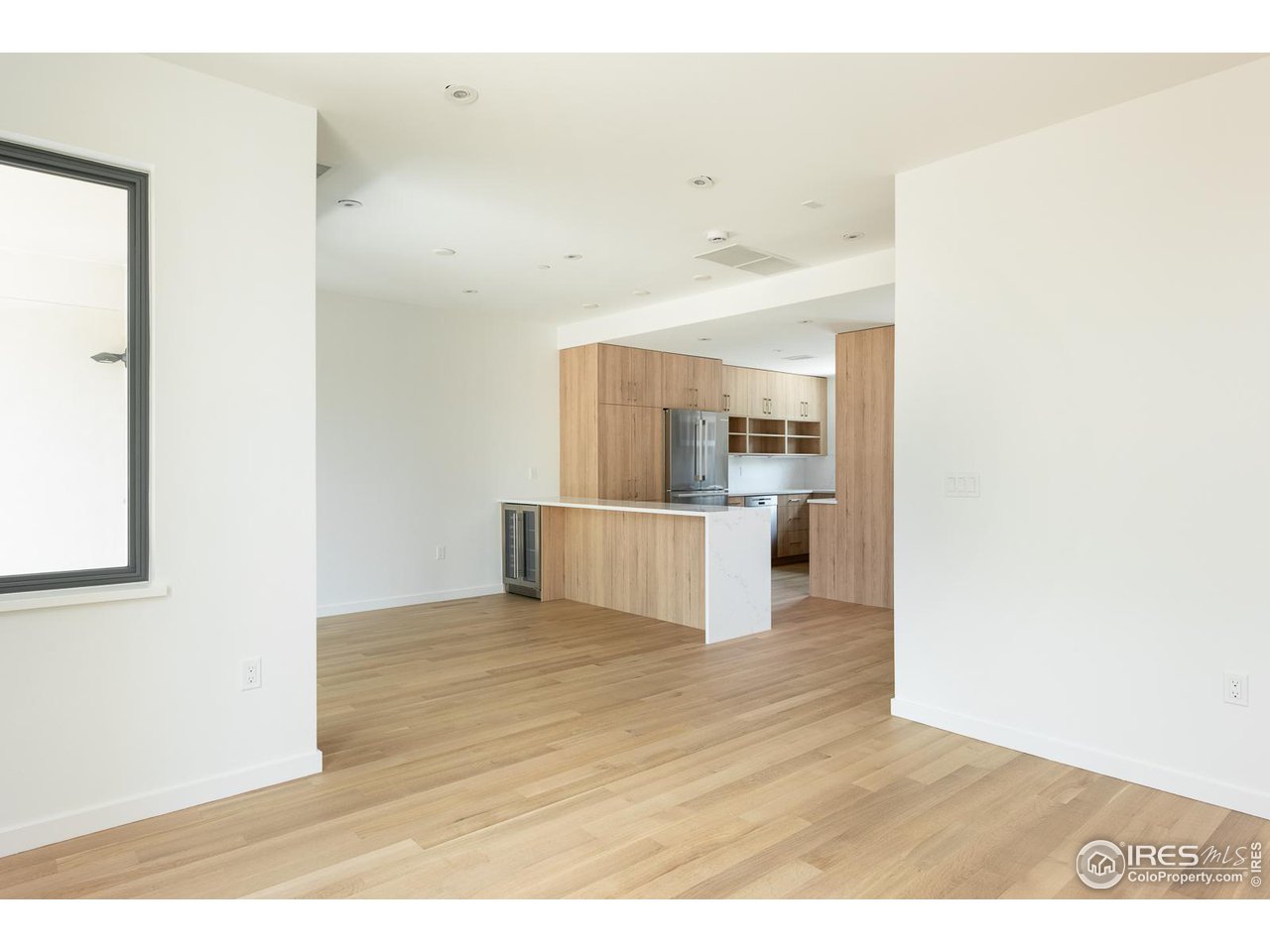 2130 Folsom Street Boulder, CO 80302 - Photo 16 of 40 a view of a kitchen with wooden floor