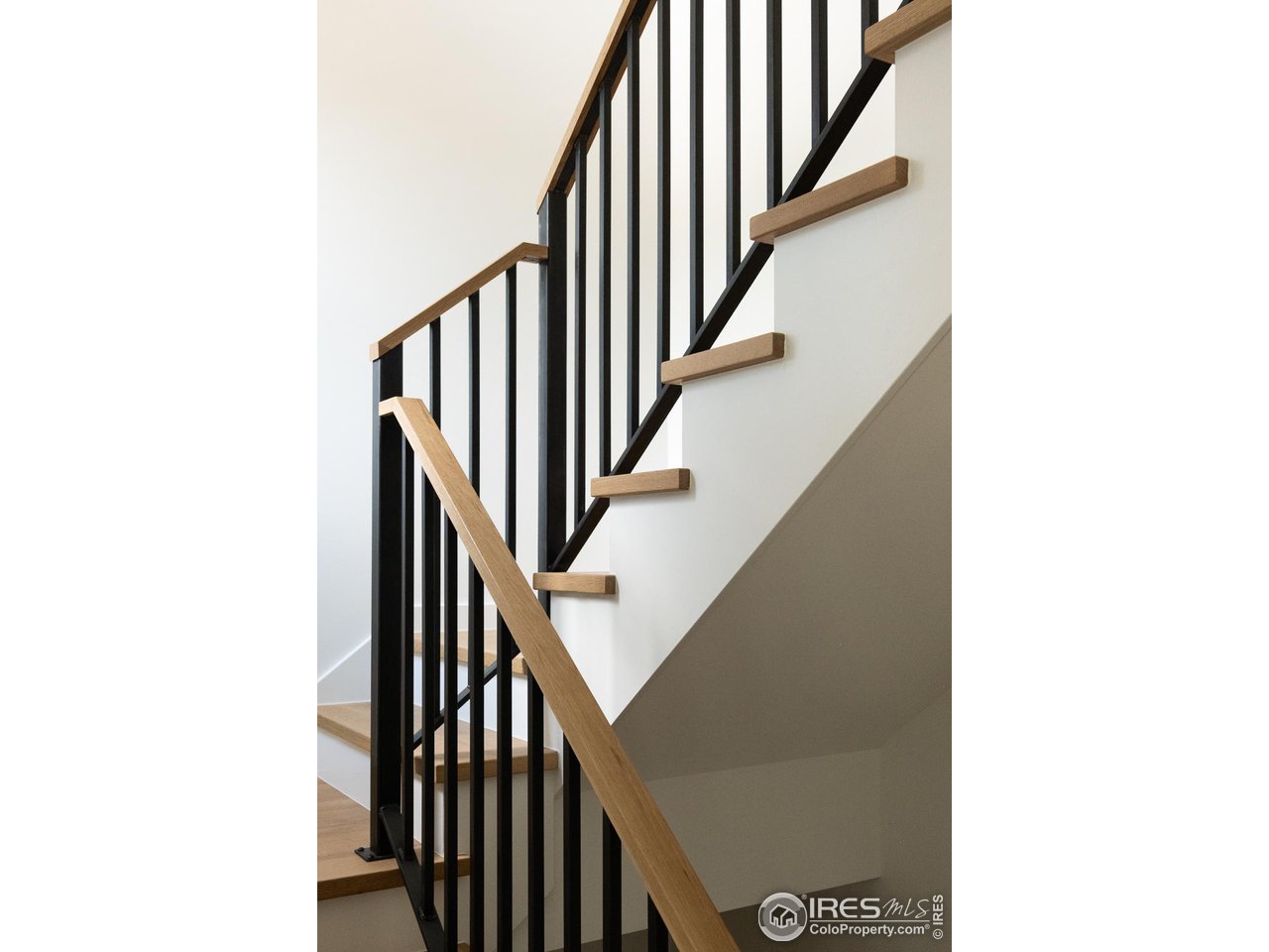2130 Folsom Street Boulder, CO 80302 - Photo 20 of 40 a view of a hallway with staircase