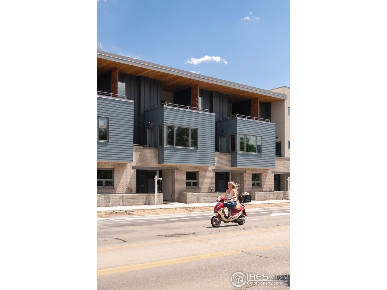 2130 Folsom Street Boulder, CO 80302 - Photo 2 of 40 a view of a building with cars parked in front of it
