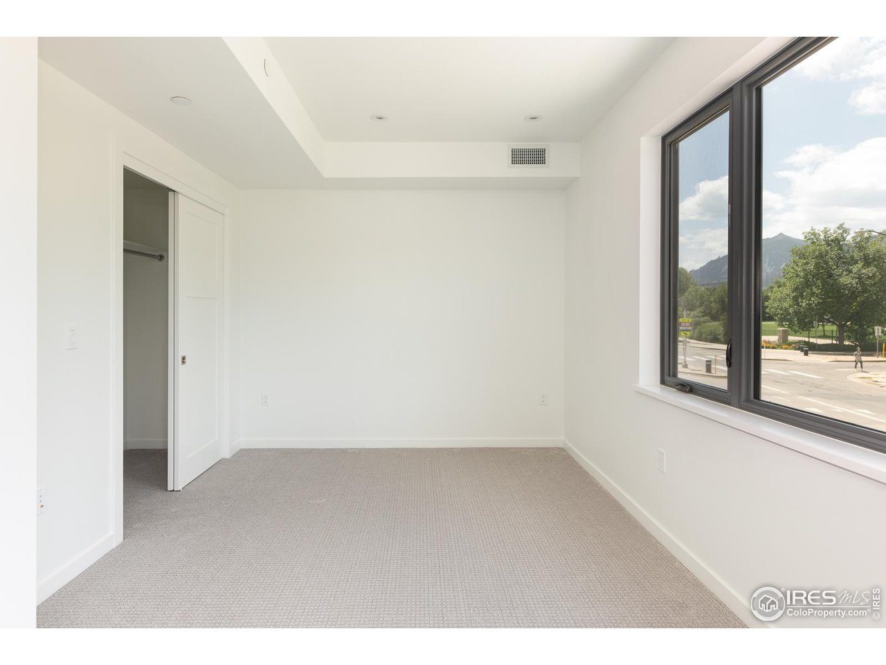 2130 Folsom Street Boulder, CO 80302 - Photo 26 of 40 a view of an empty room with a window