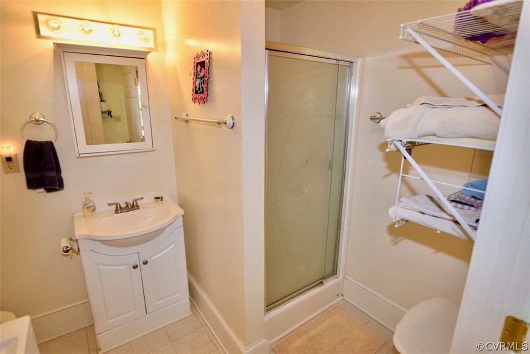 3675 Namozine Road Crewe, VA 23930 - Photo 17 of 48 a bathroom with a sink mirror and toilet