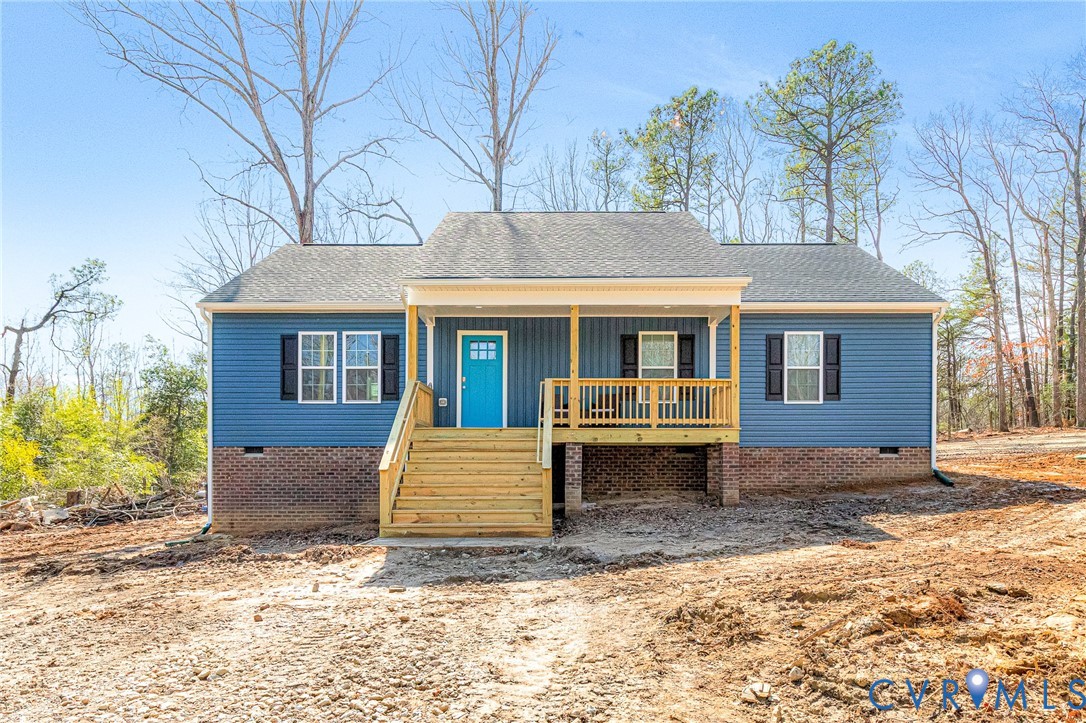 5301 Pine Fork Road Quinton, VA 23141 - Photo 3 of 41 a front view of a house with a yard and trees