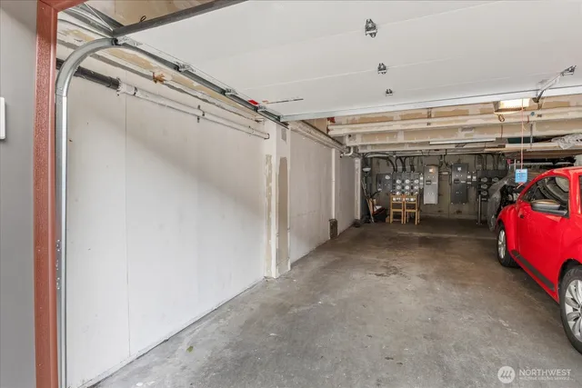 a front view of a house with a garage