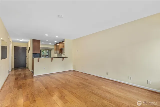 a view of a kitchen with a sink