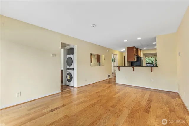 a view of a kitchen with a sink and cabinets